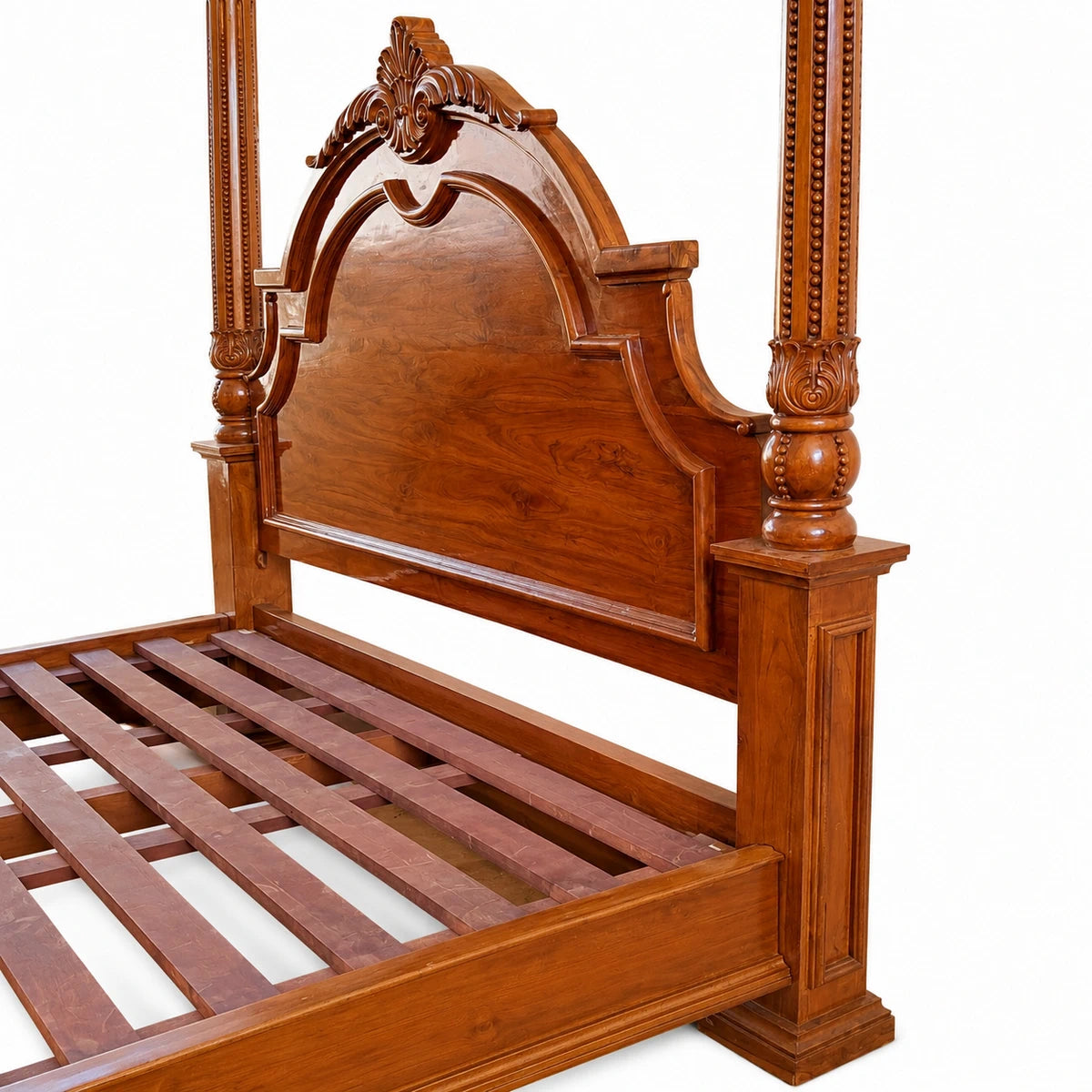 Canopy Bed with carved arced head.