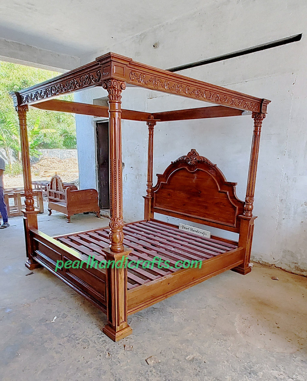 Canopy Bed with carved arced head.